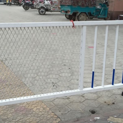 Expanded metal isolation fence