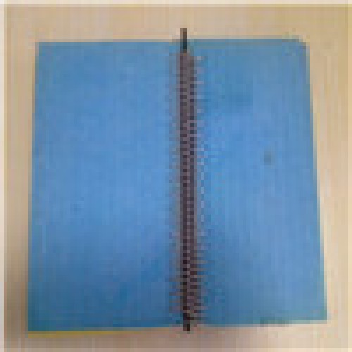 Needle corrugator belt