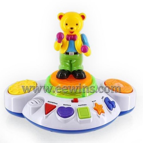 Electronic music toys with rotating bear