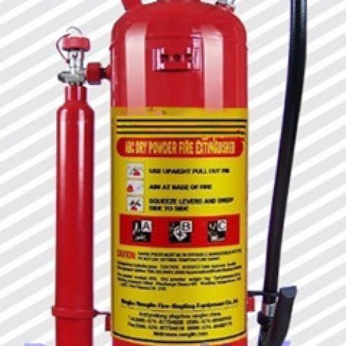 Dry powder fire extinguisher with external gas cartridge