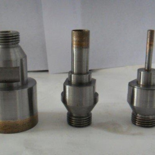 Diamond drill bits for glass