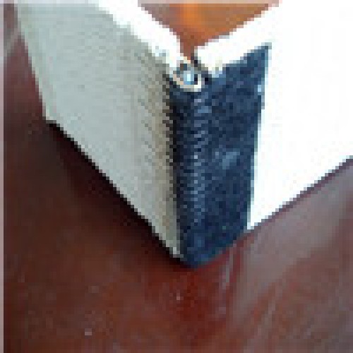 Solid woven paperboard belt