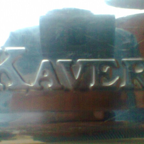 Kaveri cooktop logo on stainless steel sheet body