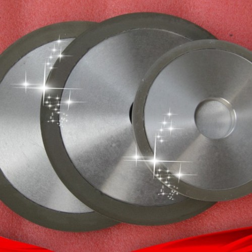 Vitrified polycrystalline diamond grinding wheel for natural diamond polishing