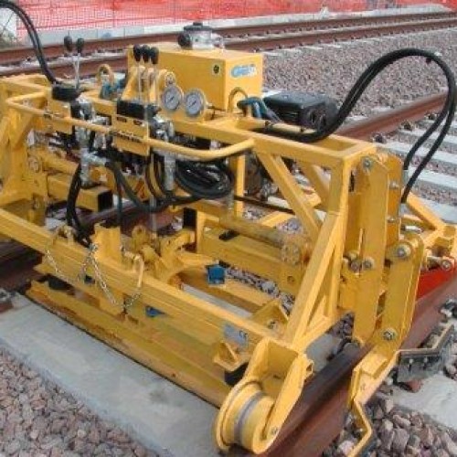 Ballast compacting machine