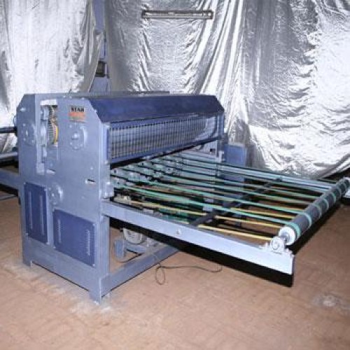 Reel sheet cutting machine