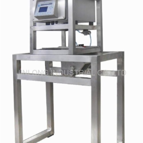 Gravity metal detector for powder product