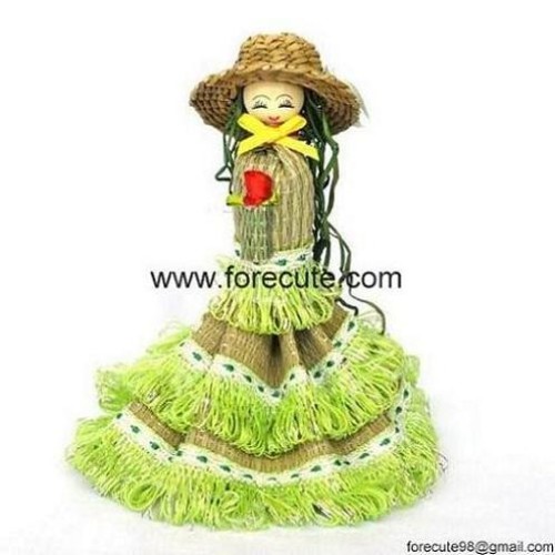 Straw barbie dolls used as tabletop decorations, christmas table decoration