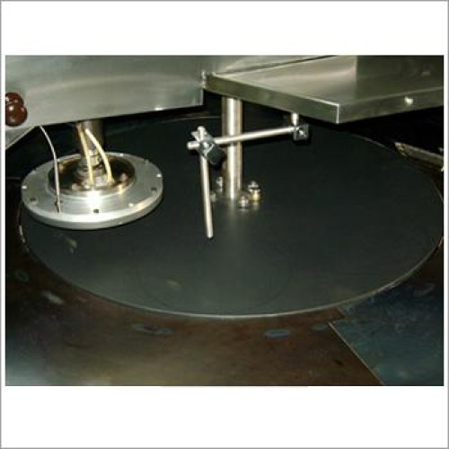 Teflon coated rotating plate