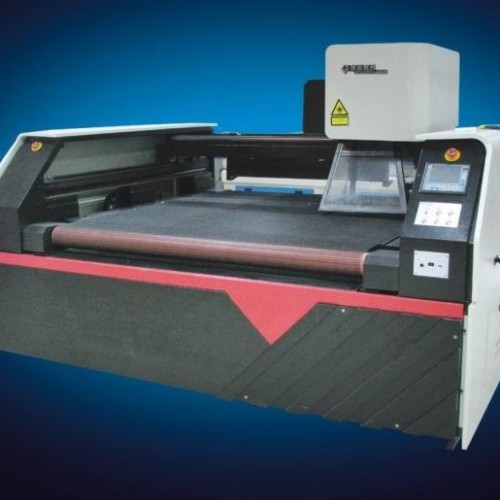 Laser engraving machine with rolls of fabric
