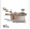 Labeling machine for top and side l