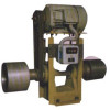 Scratching machine
